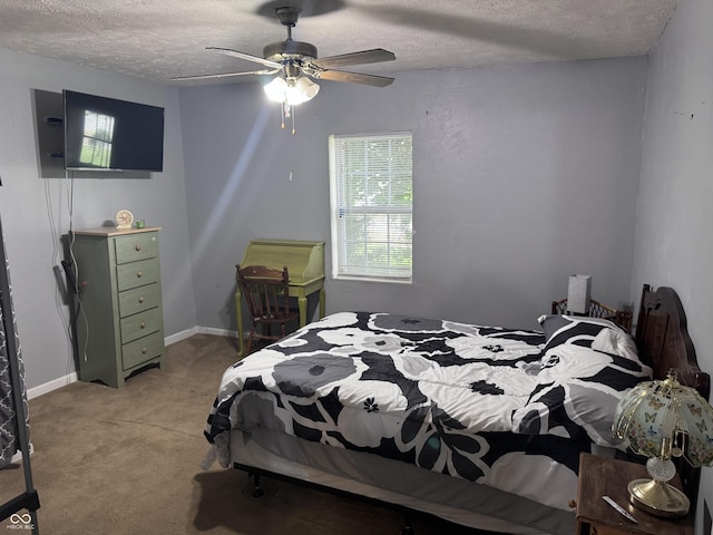 2208 S F St, Elwood, IN 46036 - bedroom with a textured ceiling, light colored carpet, and a ceiling fan