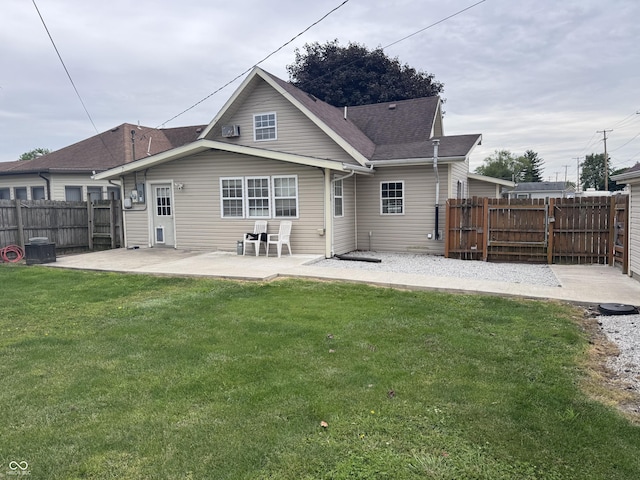 2208 S F St, Elwood, IN 46036 - back of house with a patio, a gate, and a shingled roof