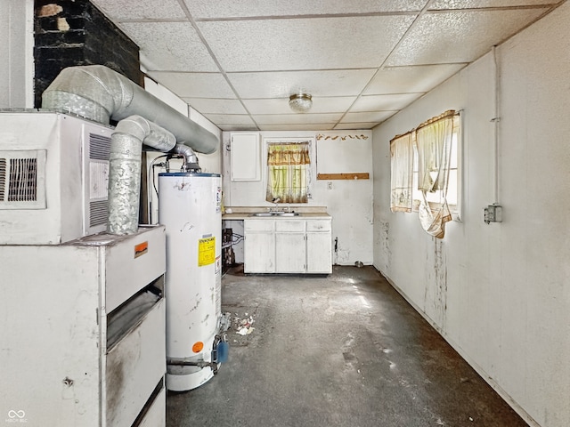 526 N Centennial St, Indianapolis, IN 46222 - basement featuring gas water heater, a paneled ceiling, and a sink