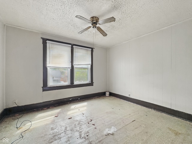 526 N Centennial St, Indianapolis, IN 46222 - unfurnished room featuring a ceiling fan, a textured ceiling, and baseboards