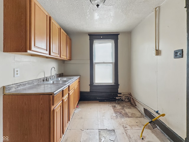 526 N Centennial St, Indianapolis, IN 46222 - washroom featuring a textured ceiling and a sink