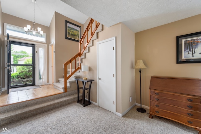 6263 Behner Way, Indianapolis, IN 46250 - carpeted foyer entrance with a chandelier, stairway, and baseboards