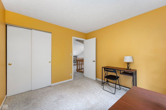 6263 Behner Way, Indianapolis, IN 46250 - bedroom with carpet flooring, baseboards, and a closet