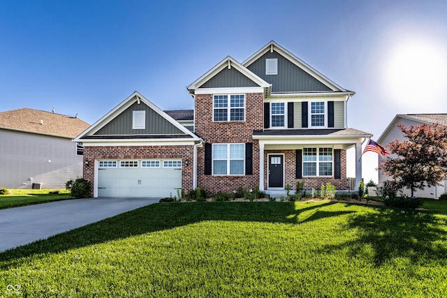 1065 Park Ct, Avon, IN 46123 - view of front of property with board and batten siding, driveway, brick siding, and a front yard