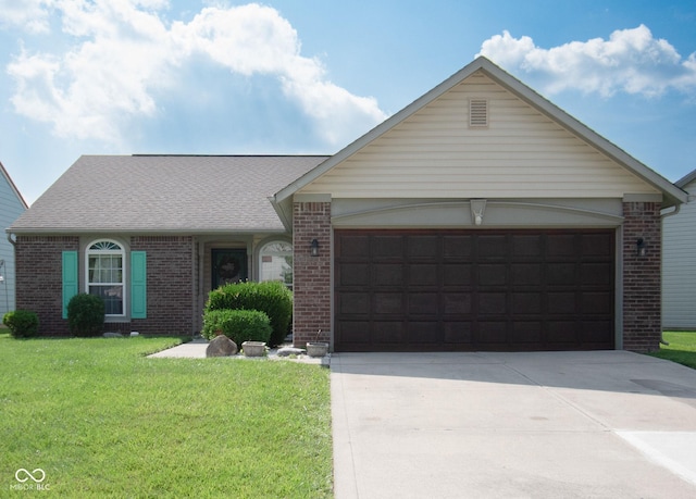 540 Cahill Ln, Indianapolis, IN 46214 - ranch-style house with brick siding, driveway, an attached garage, a front lawn, and roof with shingles