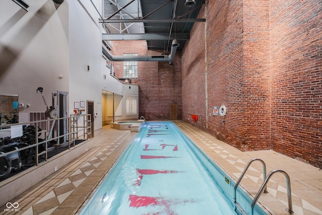 611 N Park Ave Unit 108, Indianapolis, IN 46204 - view of pool featuring a pool with connected hot tub