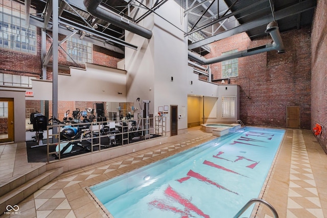 611 N Park Ave Unit 108, Indianapolis, IN 46204 - view of swimming pool featuring a pool with connected hot tub