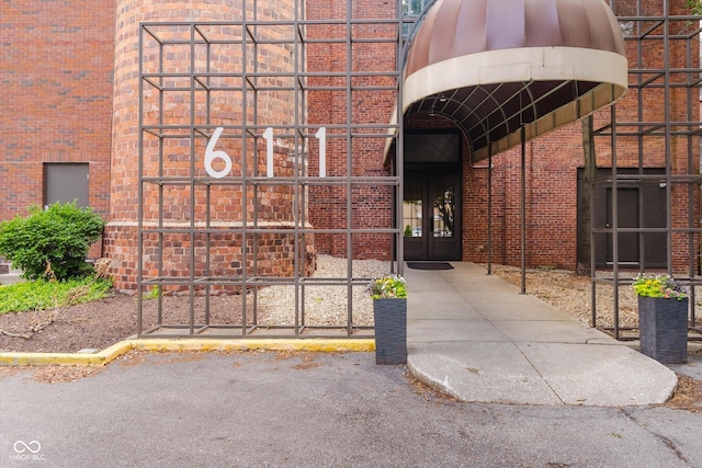 611 N Park Ave Unit 108, Indianapolis, IN 46204 - view of exterior entry with brick siding