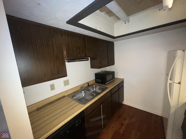 5711 Bradston Way, Indianapolis, IN 46237 - kitchen with black appliances, a sink, dark wood finished floors, dark brown cabinetry, and light countertops