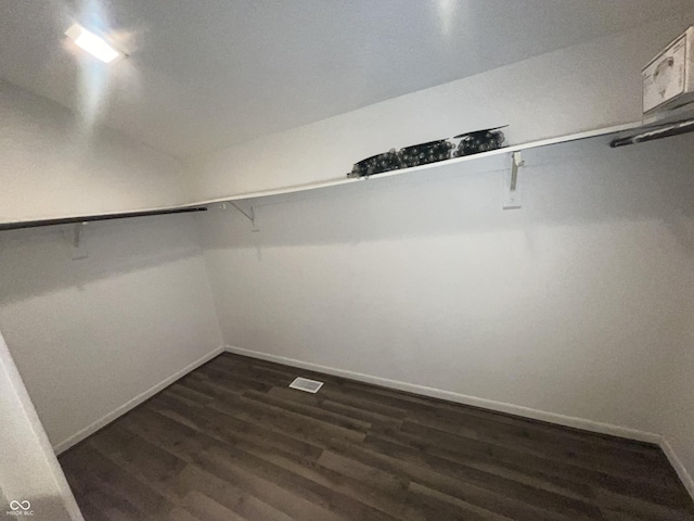 5711 Bradston Way, Indianapolis, IN 46237 - walk in closet featuring dark wood finished floors