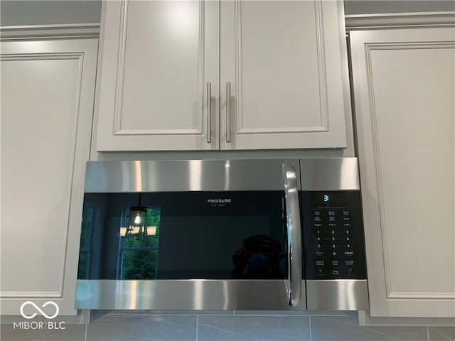 17399 Dovehouse Ln, Westfield, IN 46074 - kitchen view of stainless steel microwave and white cabinets