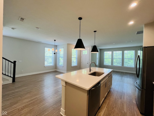 17399 Dovehouse Ln, Westfield, IN 46074 - kitchen featuring a sink, stainless steel appliances, baseboards, dark wood finished floors, and recessed lighting