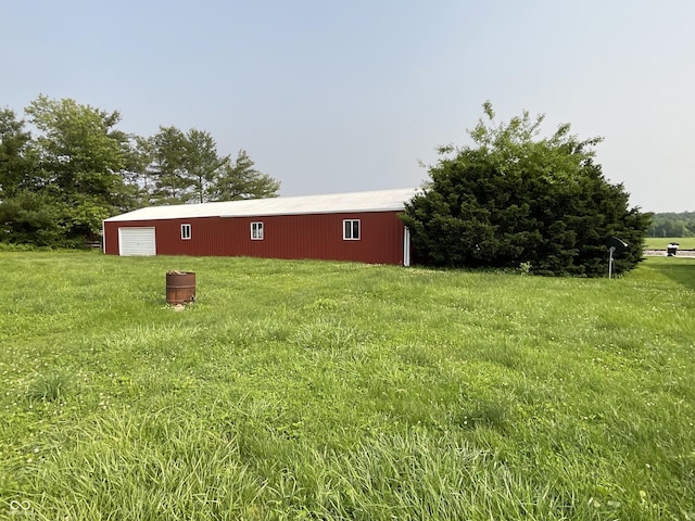 851 E Franklin St, Spencer, IN 47460 - view of yard featuring a detached garage, a pole building, and an outbuilding