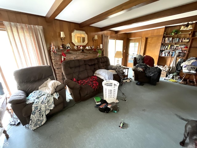 851 E Franklin St, Spencer, IN 47460 - carpeted living room featuring beam ceiling and wooden walls
