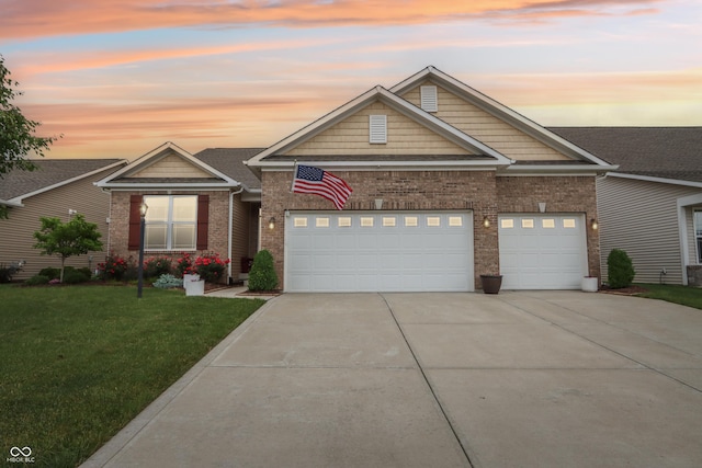 1468 Blackthorne Trl N, Plainfield, IN 46168 - traditional-style home with driveway, a yard, an attached garage, and brick siding