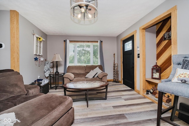 1254 N State Road 39, Frankfort, IN 46041 - living area featuring a chandelier and light wood-style floors