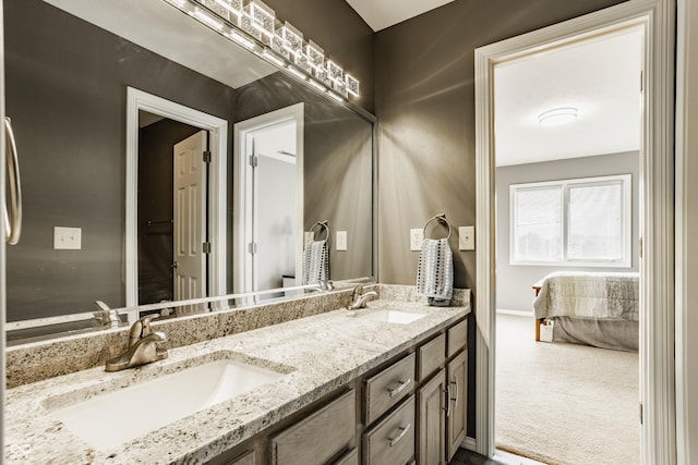 12539 Pebblepointe Pass, Carmel, IN 46033 - ensuite bathroom with double vanity and baseboards