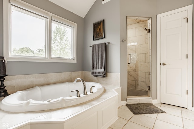 12539 Pebblepointe Pass, Carmel, IN 46033 - full bath with a tub with jets, a shower stall, plenty of natural light, tile patterned floors, and vaulted ceiling