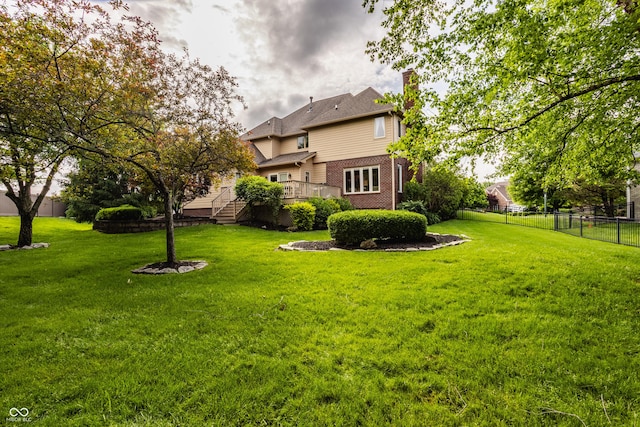 12539 Pebblepointe Pass, Carmel, IN 46033 - view of yard featuring a deck and stairs
