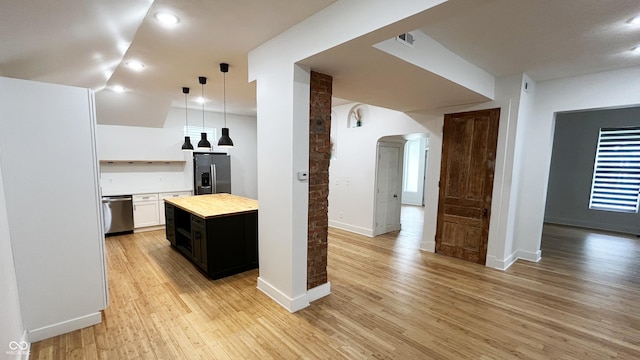 909 N Temple Ave, Indianapolis, IN 46201 - kitchen featuring stainless steel appliances, light wood-style floors, butcher block counters, hanging light fixtures, and recessed lighting