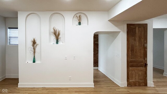 909 N Temple Ave, Indianapolis, IN 46201 - corridor featuring light wood finished floors and baseboards