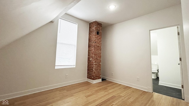 909 N Temple Ave, Indianapolis, IN 46201 - bonus room with light wood-style flooring, baseboards, and lofted ceiling