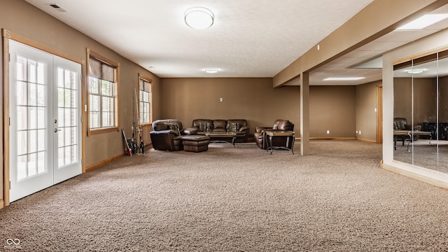 719 E New Rd, Greenfield, IN 46140 - carpeted living area featuring baseboards and french doors