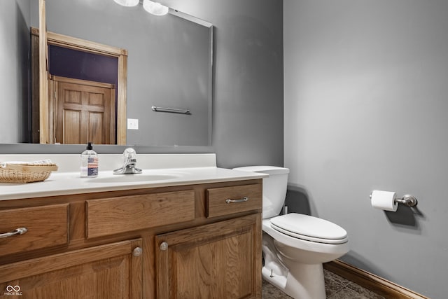 719 E New Rd, Greenfield, IN 46140 - half bath with vanity, toilet, and baseboards