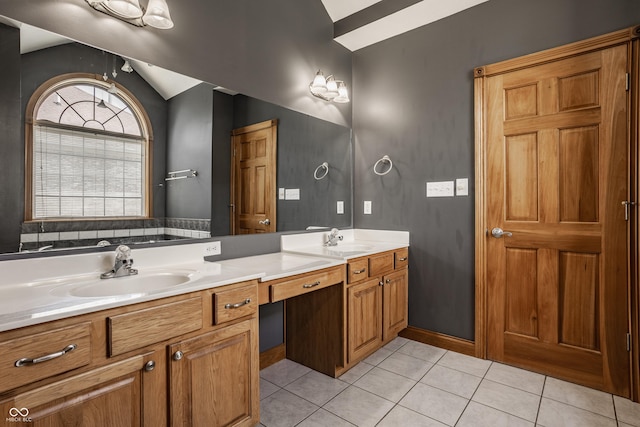 719 E New Rd, Greenfield, IN 46140 - full bathroom with tile patterned flooring, vaulted ceiling, and double vanity