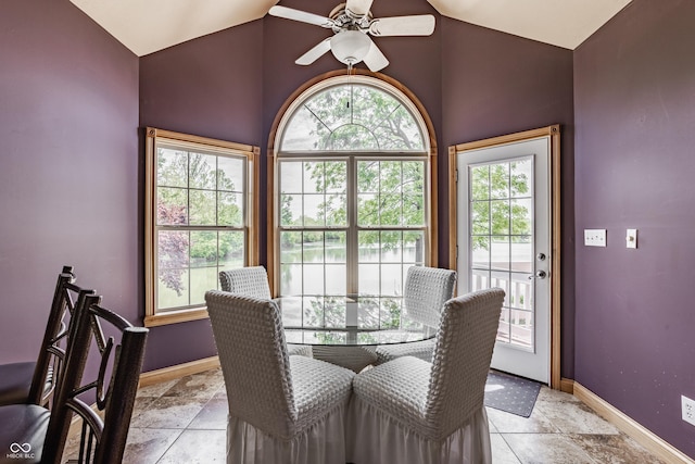 719 E New Rd, Greenfield, IN 46140 - dining space with plenty of natural light, ceiling fan, vaulted ceiling, and baseboards