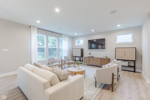 1085 Bevy Blvd, Danville, IN 46122 - living area with light wood-style flooring, baseboards, and recessed lighting