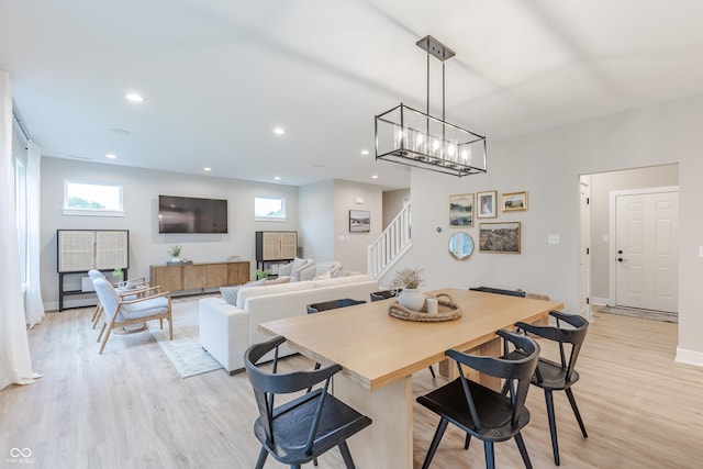 1085 Bevy Blvd, Danville, IN 46122 - dining area featuring stairway, light wood finished floors, plenty of natural light, and recessed lighting