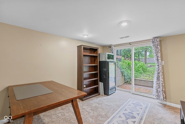 426 Tipton Ln, Columbus, IN 47201 - home office with carpet floors and baseboards
