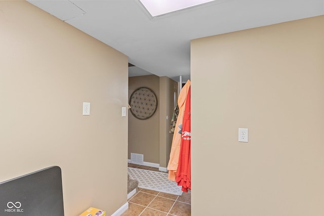 426 Tipton Ln, Columbus, IN 47201 - hallway featuring tile patterned flooring