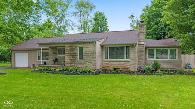 426 Tipton Ln, Columbus, IN 47201 - view of front facade with stone siding, a garage, a chimney, driveway, and a shingled roof
