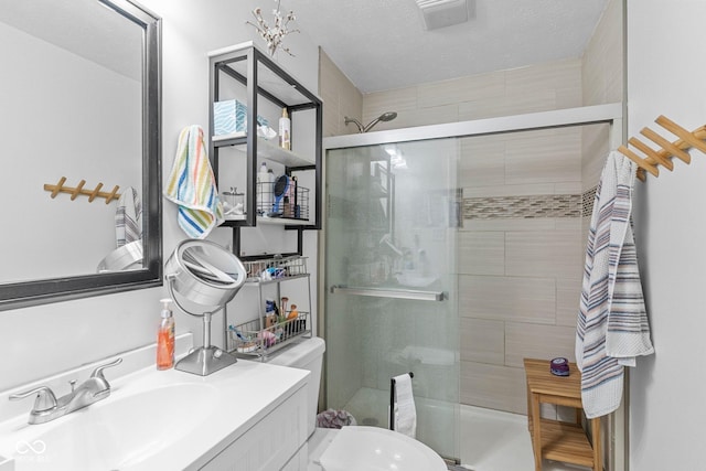 426 Tipton Ln, Columbus, IN 47201 - bathroom with a stall shower, toilet, and vanity