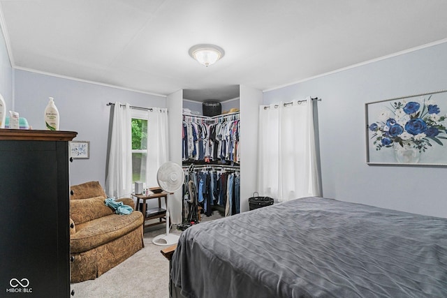 426 Tipton Ln, Columbus, IN 47201 - carpeted bedroom with crown molding and a closet