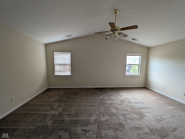 10722 Mistflower Way, Indianapolis, IN 46235 - unfurnished room featuring ceiling fan, carpet floors, lofted ceiling, and baseboards