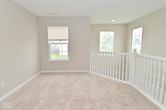 10722 Mistflower Way, Indianapolis, IN 46235 - empty room with carpet and healthy amount of natural light
