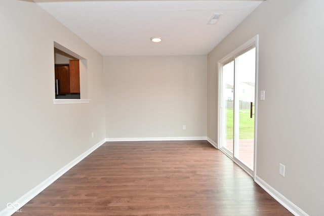 10722 Mistflower Way, Indianapolis, IN 46235 - unfurnished room featuring wood finished floors and baseboards