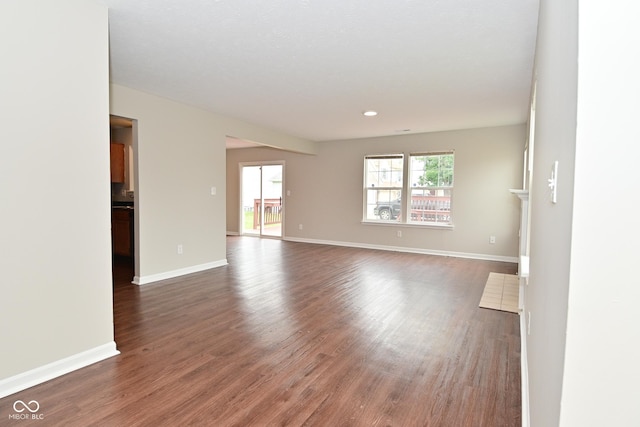 10722 Mistflower Way, Indianapolis, IN 46235 - empty room featuring wood finished floors and recessed lighting