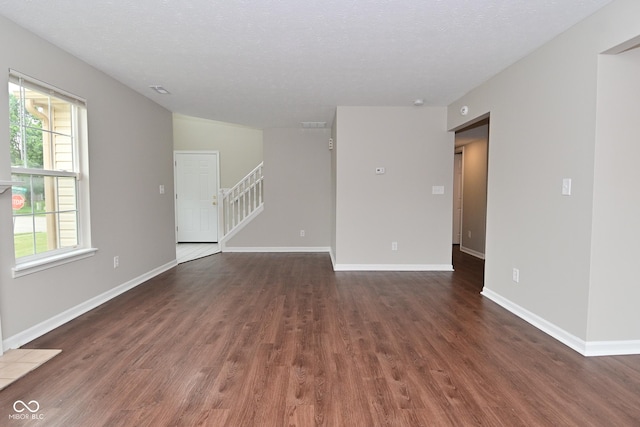 10722 Mistflower Way, Indianapolis, IN 46235 - unfurnished room with stairs and dark wood finished floors