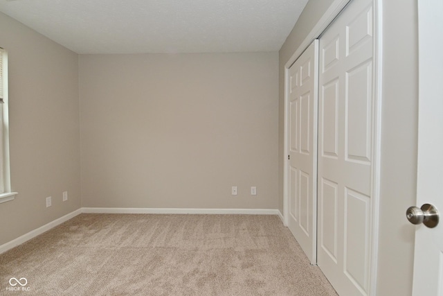 10722 Mistflower Way, Indianapolis, IN 46235 - unfurnished bedroom featuring carpet and a closet