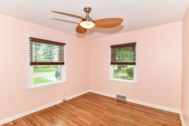 2526 Dell Zell Dr, Indianapolis, IN 46220 - empty room with baseboards, light wood-type flooring, and a ceiling fan
