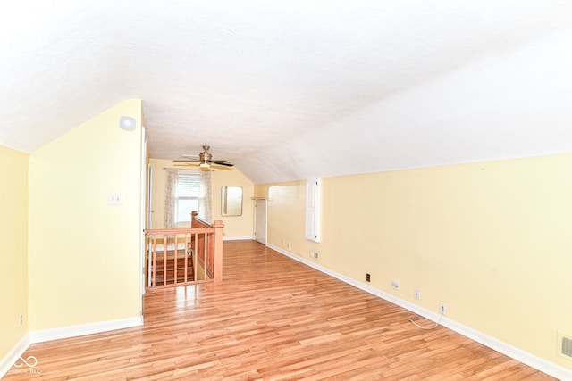 2526 Dell Zell Dr, Indianapolis, IN 46220 - bonus room featuring light wood-style flooring, vaulted ceiling, and baseboards