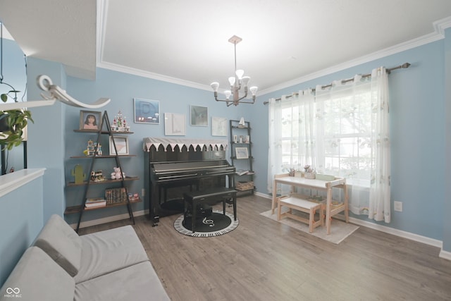 12677 Honors Dr, Carmel, IN 46033 - living area with a chandelier, ornamental molding, wood finished floors, and baseboards
