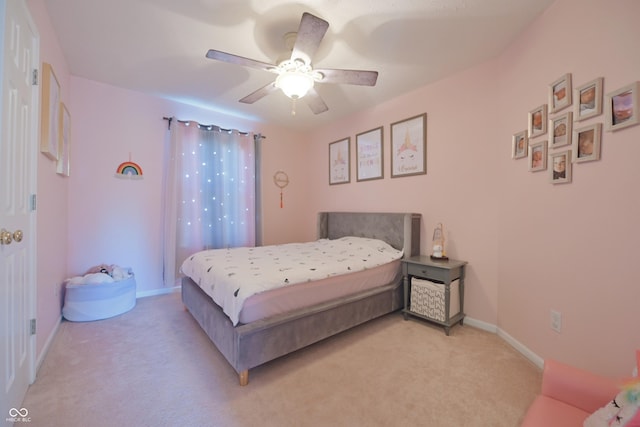 12677 Honors Dr, Carmel, IN 46033 - bedroom with light carpet, baseboards, and ceiling fan