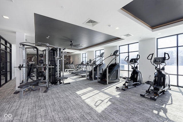 9741 Oleander Dr, Fishers, IN 46250 - gym with a raised ceiling, carpet, a ceiling fan, and recessed lighting