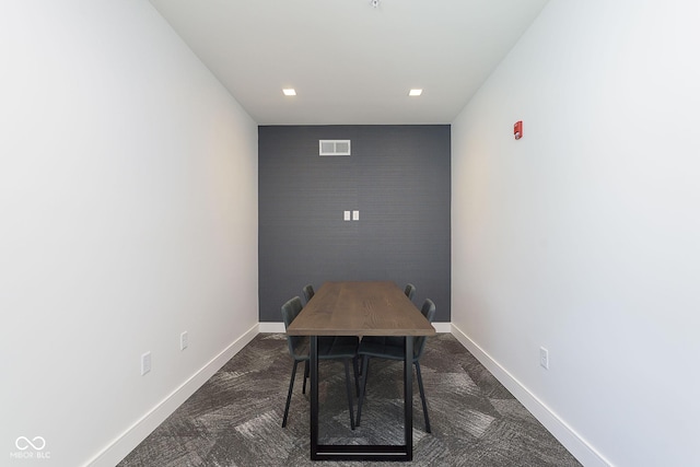 9741 Oleander Dr, Fishers, IN 46250 - dining space featuring dark colored carpet and baseboards
