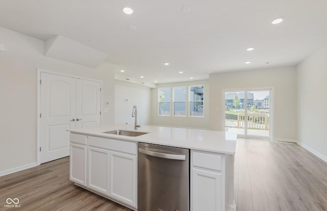 9741 Oleander Dr, Fishers, IN 46250 - kitchen featuring dishwasher, light wood-type flooring, recessed lighting, and white cabinets